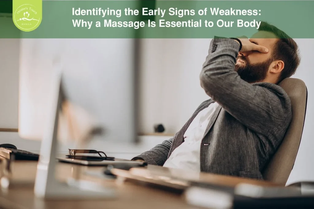 Man with stress symptoms at work, highlighting the importance of massage therapy.