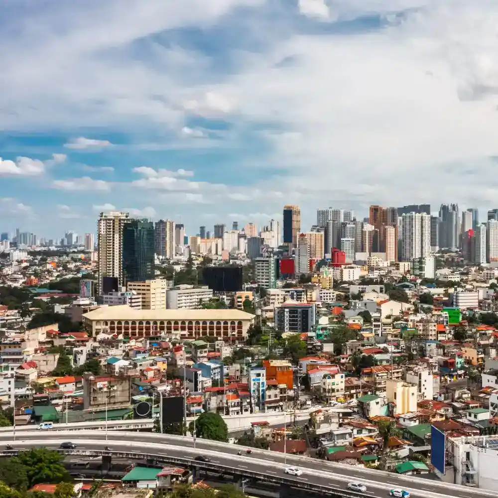 Manila city skyline with skyscrapers and urban landscape.